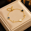 18 Karat Gold Plated bracelet with black and white hearts