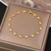 18 Karat Gold Plated bracelet with small multi hearts