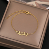 18 Karat Gold Plated bracelet with 4 hearts