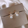 Luxury earrings with small bird in zirconia and pearl inlay